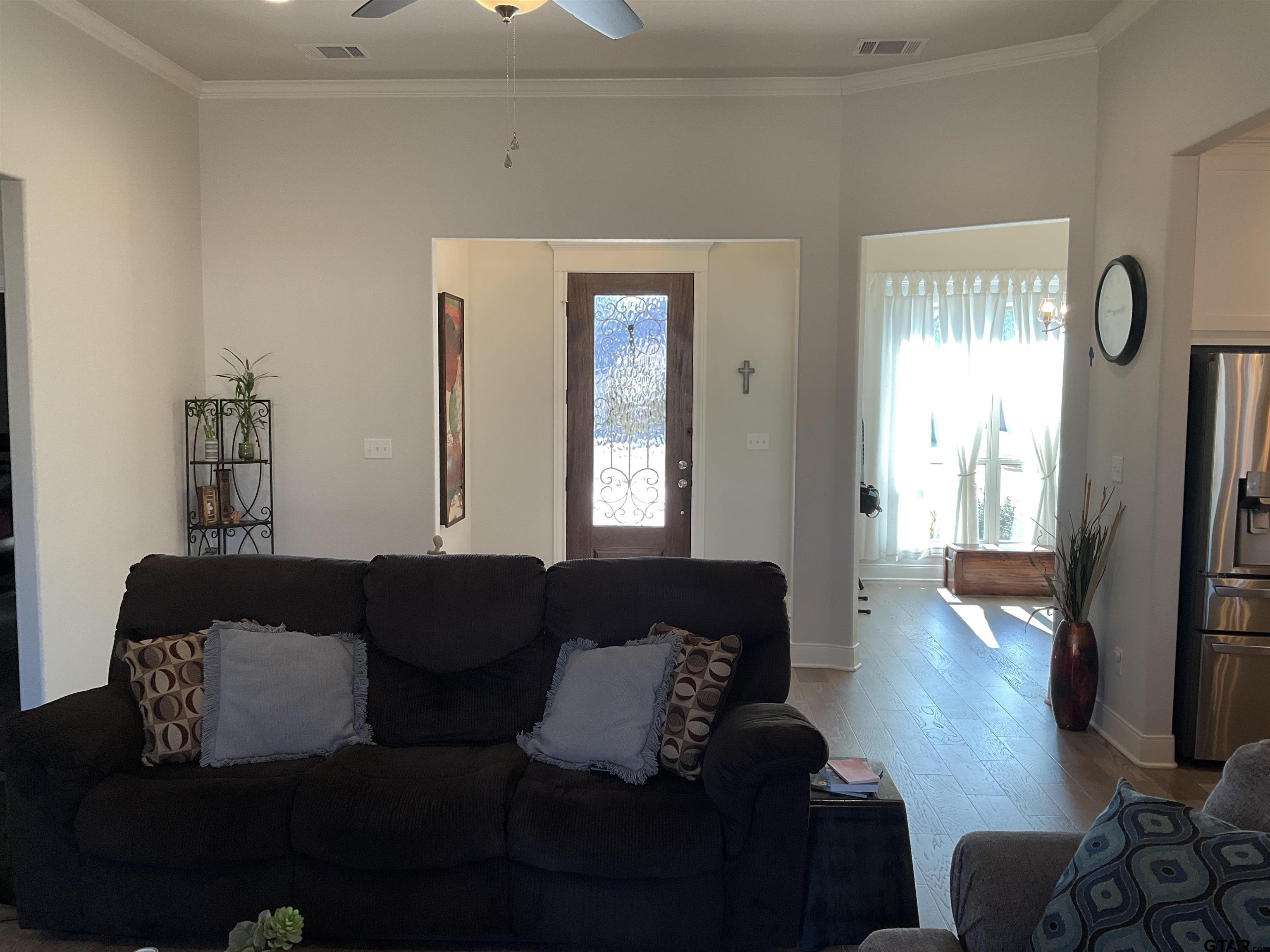 11978 Gillian Court Tyler, TX 75703 - Photo 6 of 36 a living room with furniture and a large window
