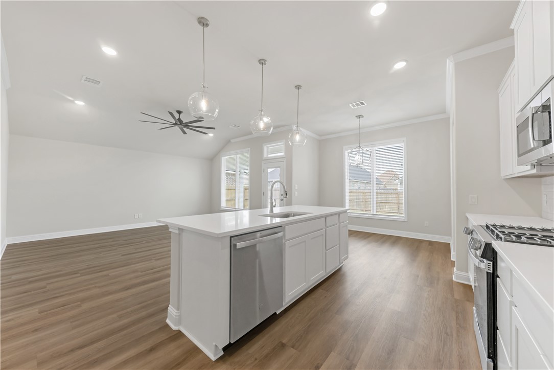 2910 Captain Court Bryan, TX 77808 - Photo 11 of 31 Kitchen looking into the living room