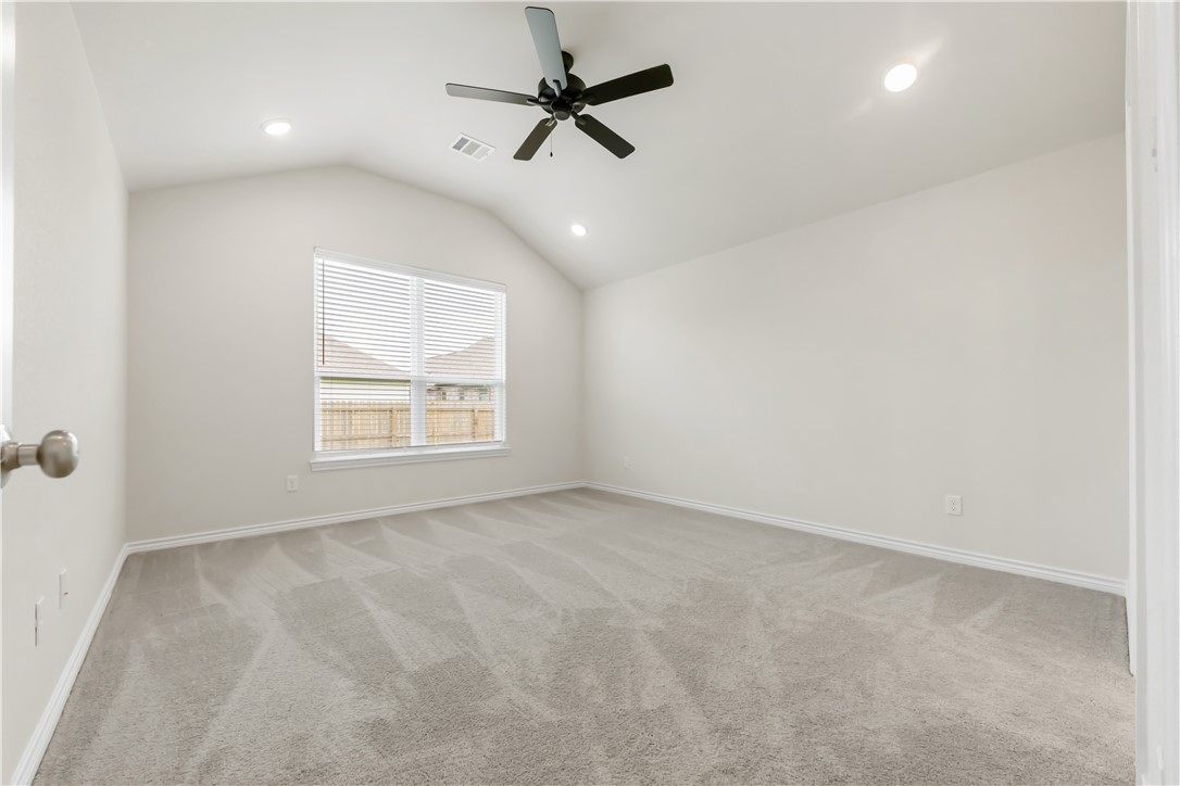 2910 Captain Court Bryan, TX 77808 - Photo 14 of 31 Primary bedroom