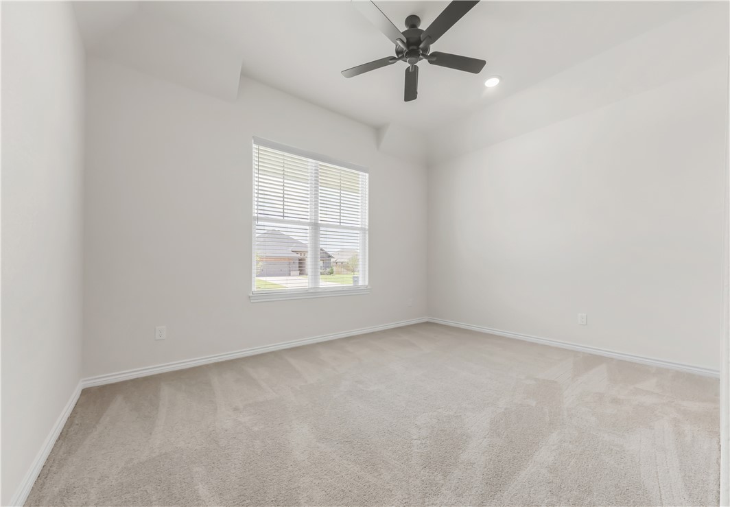 2910 Captain Court Bryan, TX 77808 - Photo 22 of 31 Bedroom at the front of the home