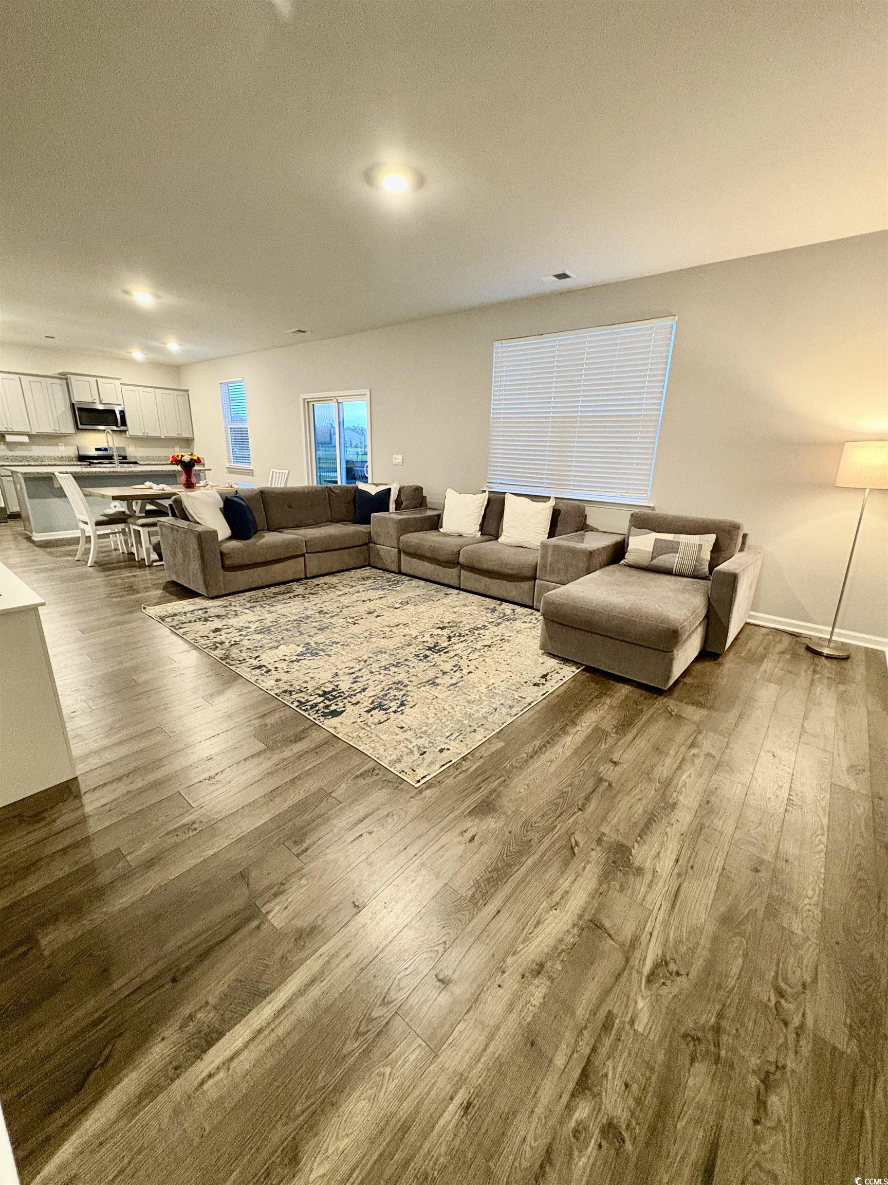 1709 Perthshire Loop Myrtle Beach, SC 29579 - Photo 14 of 38 Living room featuring dark wood finished floors, r