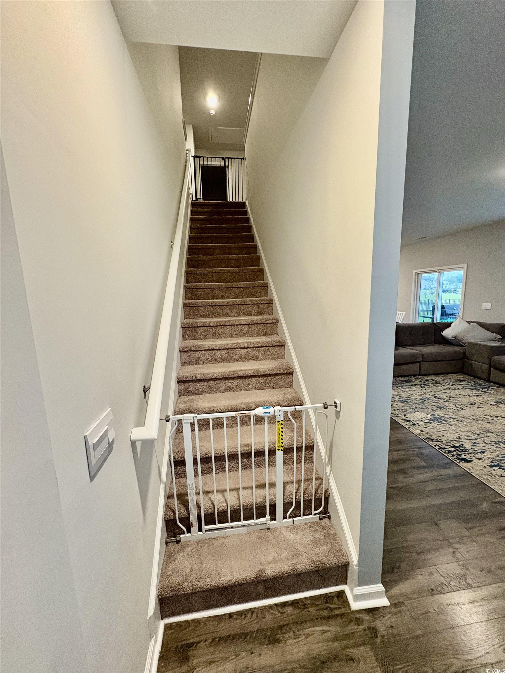 1709 Perthshire Loop Myrtle Beach, SC 29579 - Photo 16 of 38 Stairway featuring wood finished floors and basebo