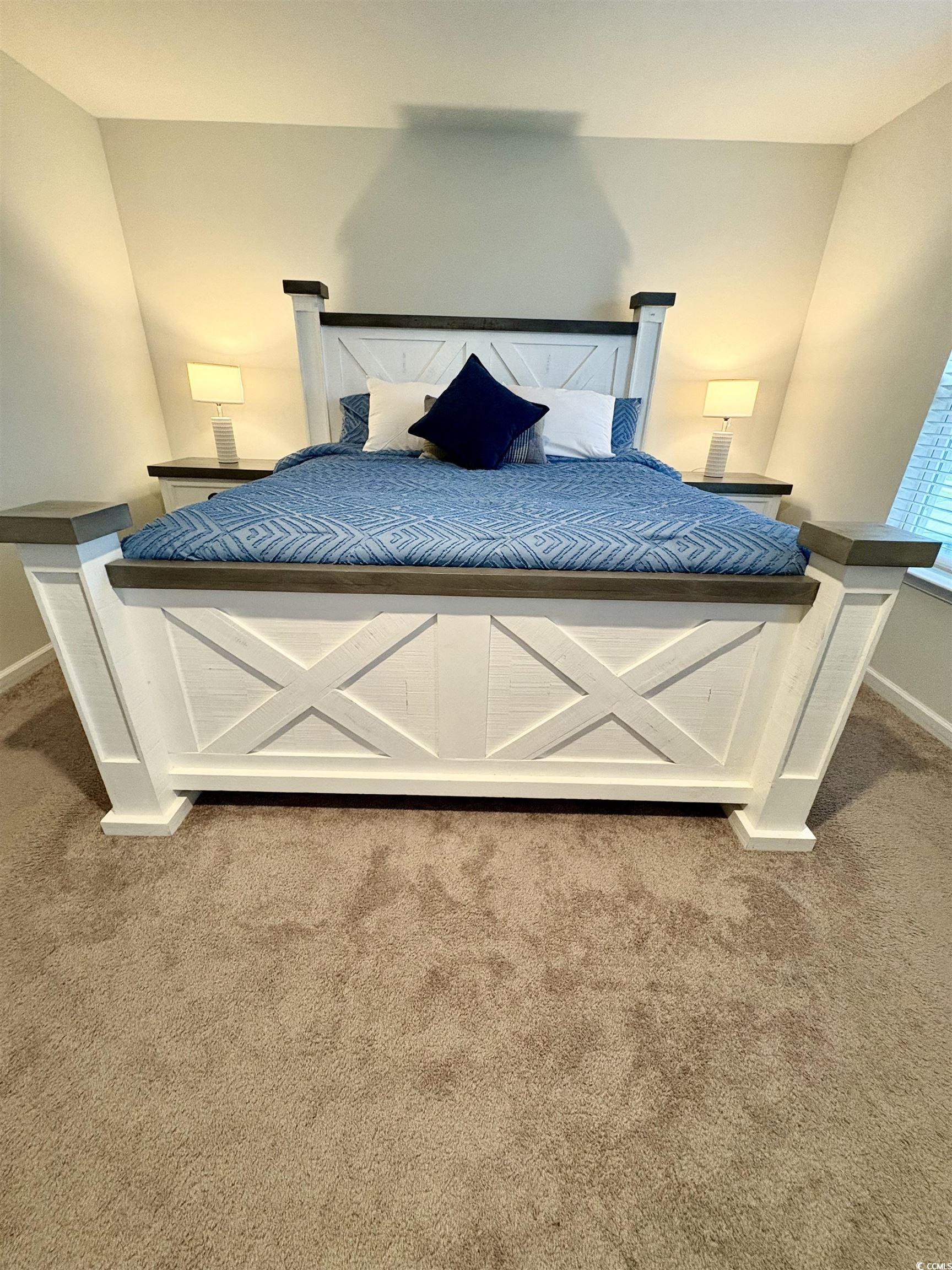1709 Perthshire Loop Myrtle Beach, SC 29579 - Photo 21 of 38 Bedroom featuring carpet flooring and baseboards