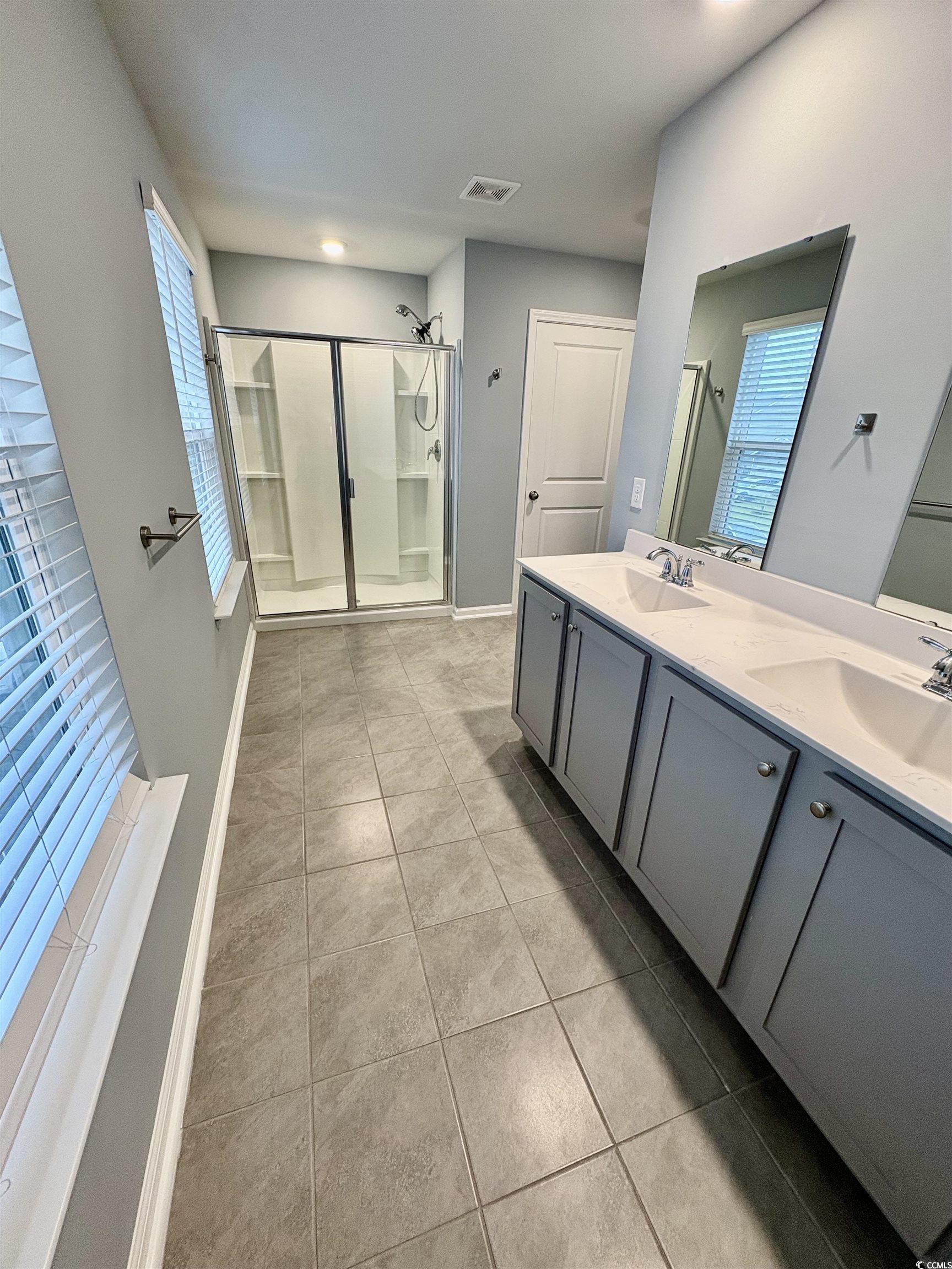 1709 Perthshire Loop Myrtle Beach, SC 29579 - Photo 23 of 38 Full bath featuring a stall shower, double vanity,