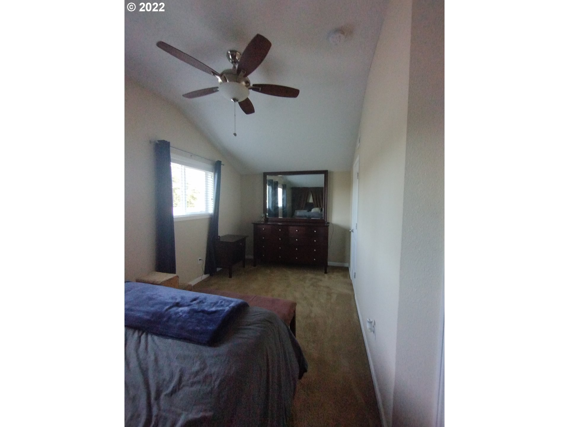 18024 Southeast Marie Street Portland, OR 97236 - Photo 12 of 31 a living room with furniture and a ceiling fan