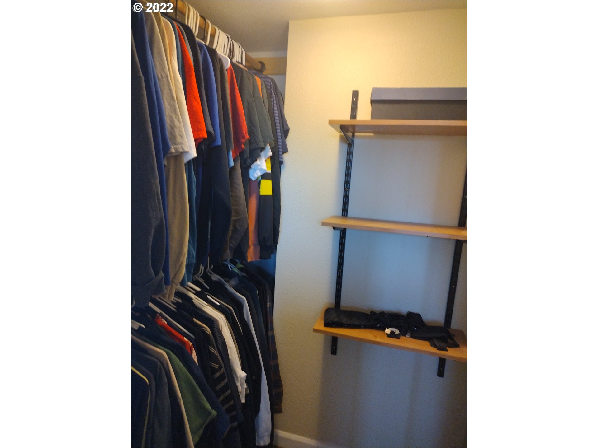 18024 Southeast Marie Street Portland, OR 97236 - Photo 14 of 31 a view of walk in closet with clothes and shoes
