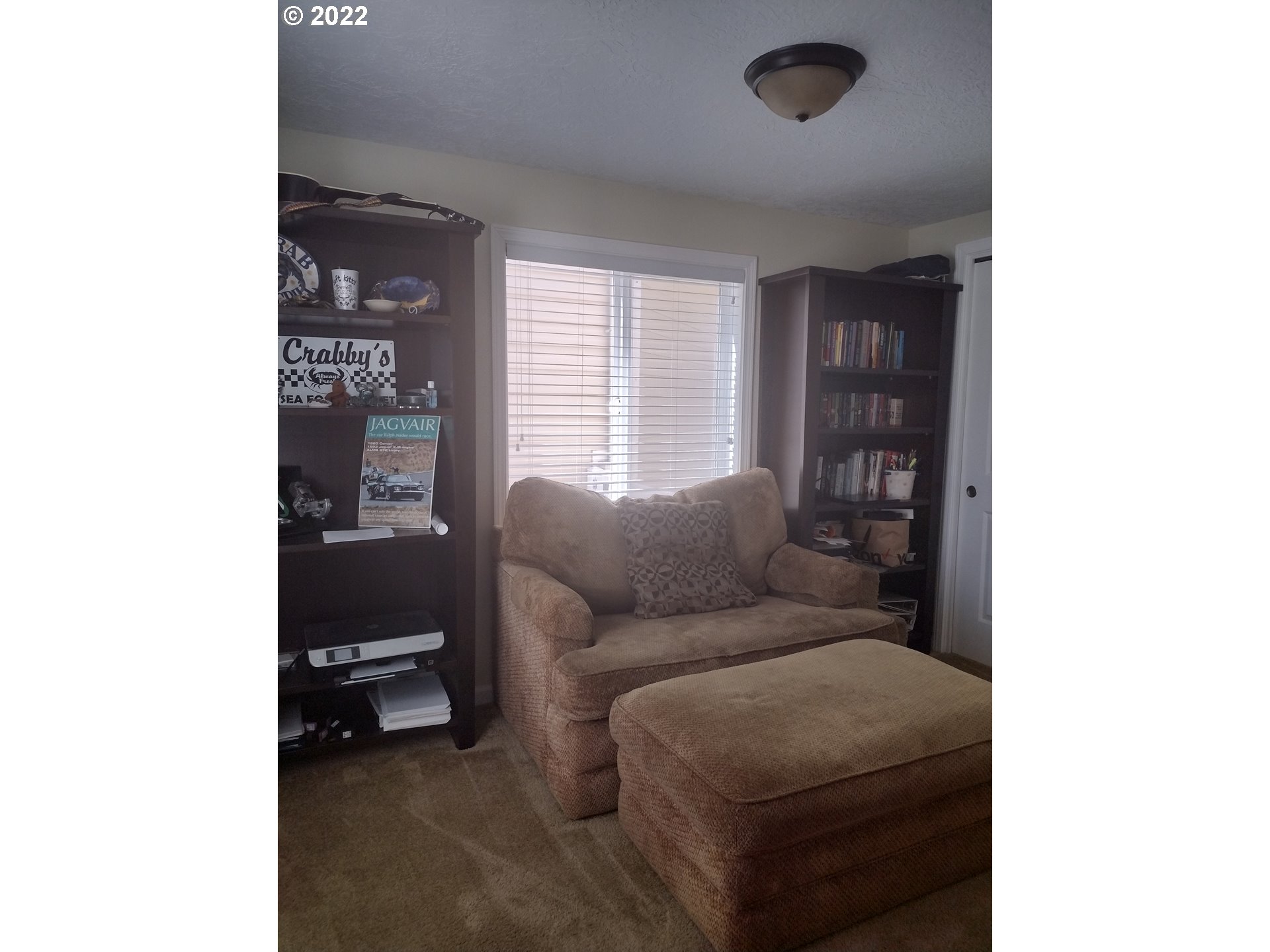 18024 Southeast Marie Street Portland, OR 97236 - Photo 20 of 31 a living room with furniture and a window
