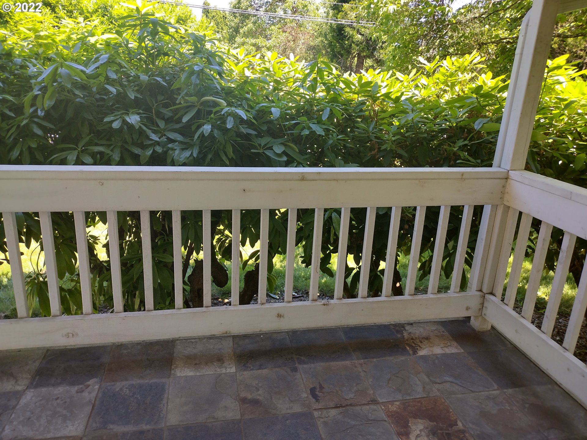 18024 Southeast Marie Street Portland, OR 97236 - Photo 22 of 31 a view of a porch