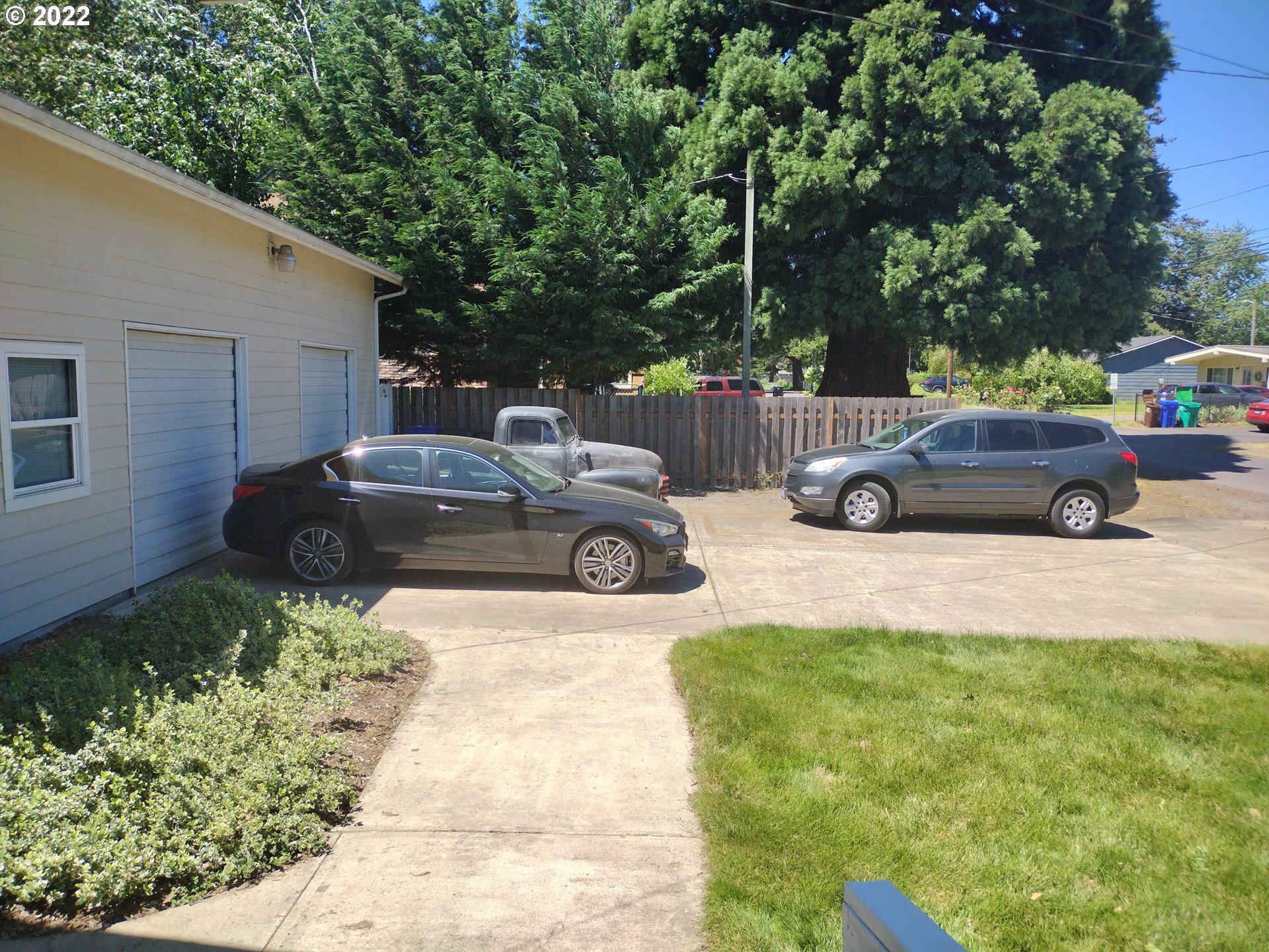 18024 Southeast Marie Street Portland, OR 97236 - Photo 31 of 31 a view of street with parked cars