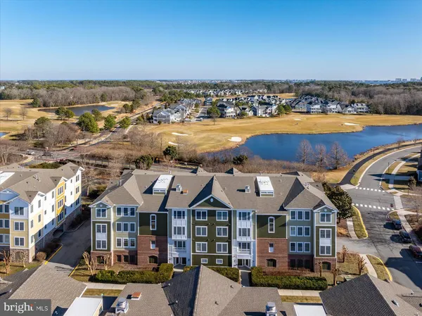 an aerial view of a house with outdoor space