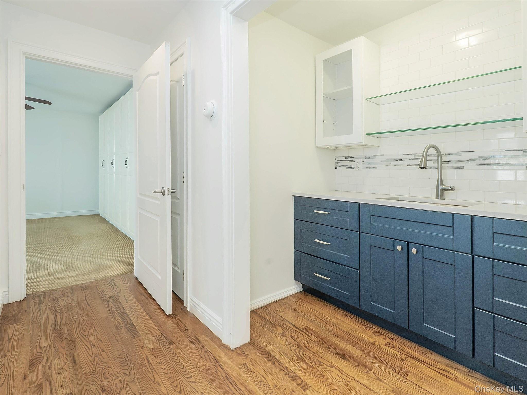 21 Marwood Road North Port Washington, NY 11050 - Photo 13 of 35 a bathroom with a sink and a mirror
