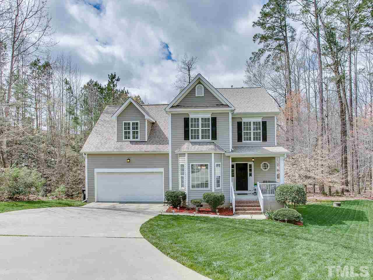 832 Kings Cross Way Raleigh, NC 27615 - Photo 1 of 25 front view of a house with a yard