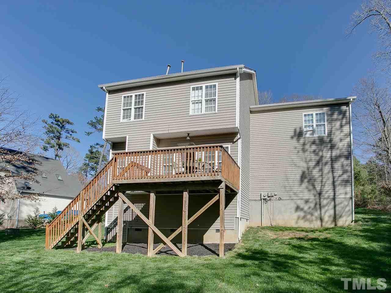 832 Kings Cross Way Raleigh, NC 27615 - Photo 22 of 25 a view of a house with backyard