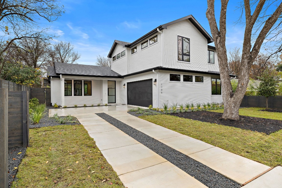 1706 Palo Duro Road Austin, TX 78757 - Photo 1 of 1 a front view of a house with a yard