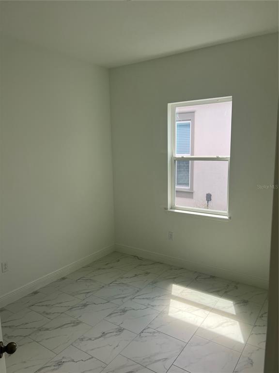 10171 Pearson Avenue Orlando, FL 32827 - Photo 11 of 16 a view of a small space with window