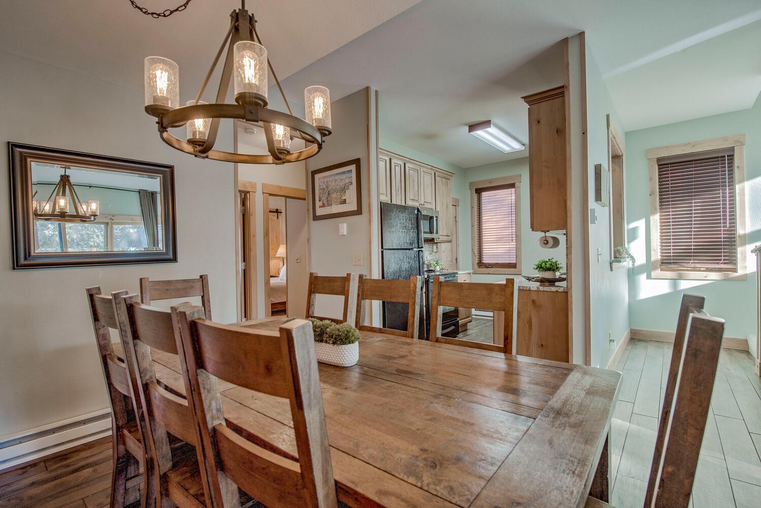 41 Washington Lode Breckenridge, CO 80424 - Photo 9 of 35 a view of a dining room with furniture a chandelier and wooden floor