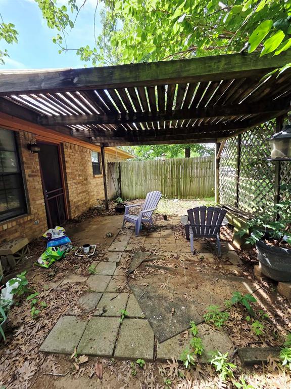 722 South Church Street Pilot Point, TX 76258 - Photo 19 of 37 a view of yard with patio