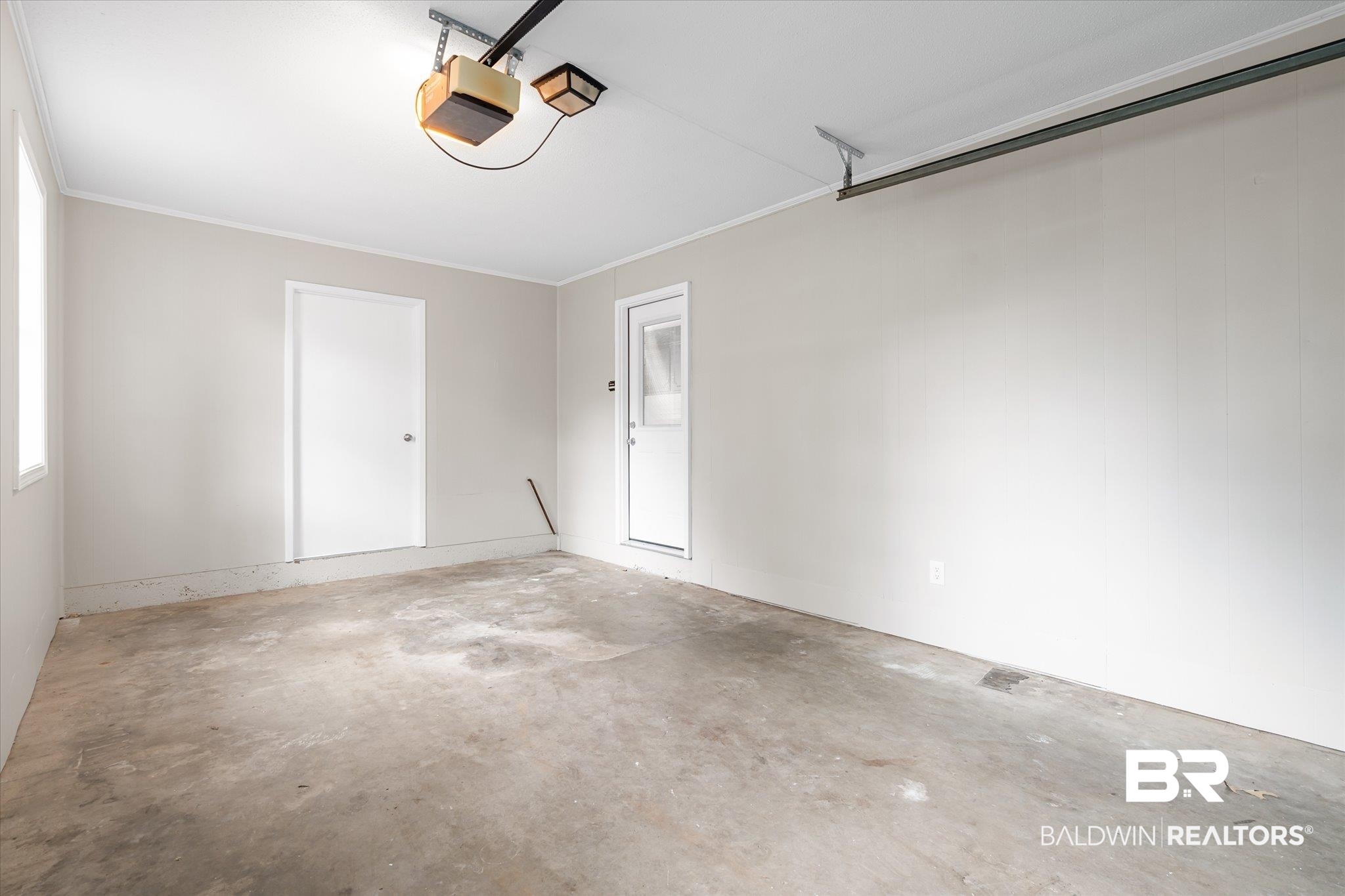 5015 Golfway Drive Eight Mile, AL 36613 - Photo 22 of 31 Garage with a garage door opener