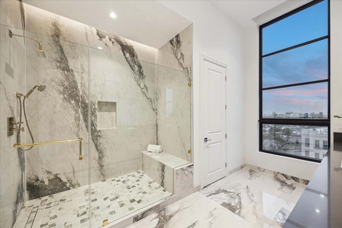 2323 San Felipe Street, Unit 1101 Houston, TX 77019 - Photo 11 of 24 a bathroom with a bathtub and shower