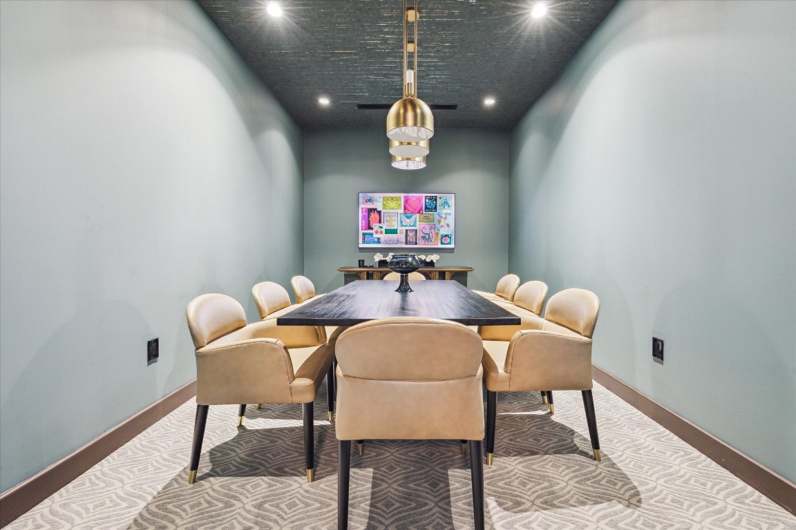 2323 San Felipe Street, Unit 1101 Houston, TX 77019 - Photo 22 of 24 a view of a dining room with furniture
