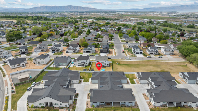 531 North Legend Way West, Unit D Mapleton, UT 84664 - Photo 33 of 42 Aerial view of residential area with a mountain backdrop
