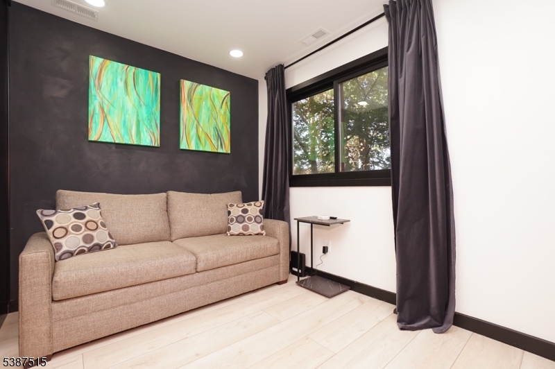 20 Augusta Drive, Unit 3 Vernon, NJ 07462 - Photo 5 of 11 a living room with furniture and a window