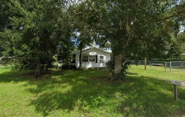 a house view with a garden space