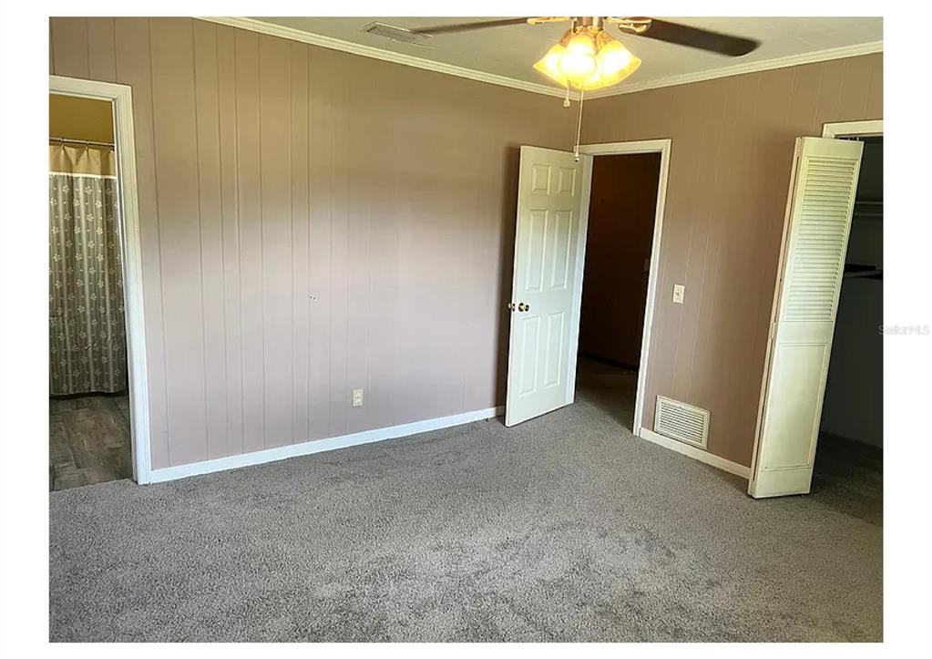 1657 Richland Avenue Deland, FL 32724 - Photo 3 of 5 a view of an empty room with a window