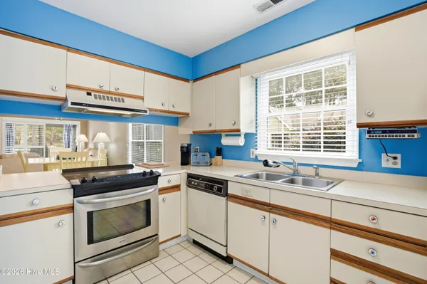 $297,000 | 350 Sea Trail Drive East, Unit 4, Sunset Beach, NC 28468