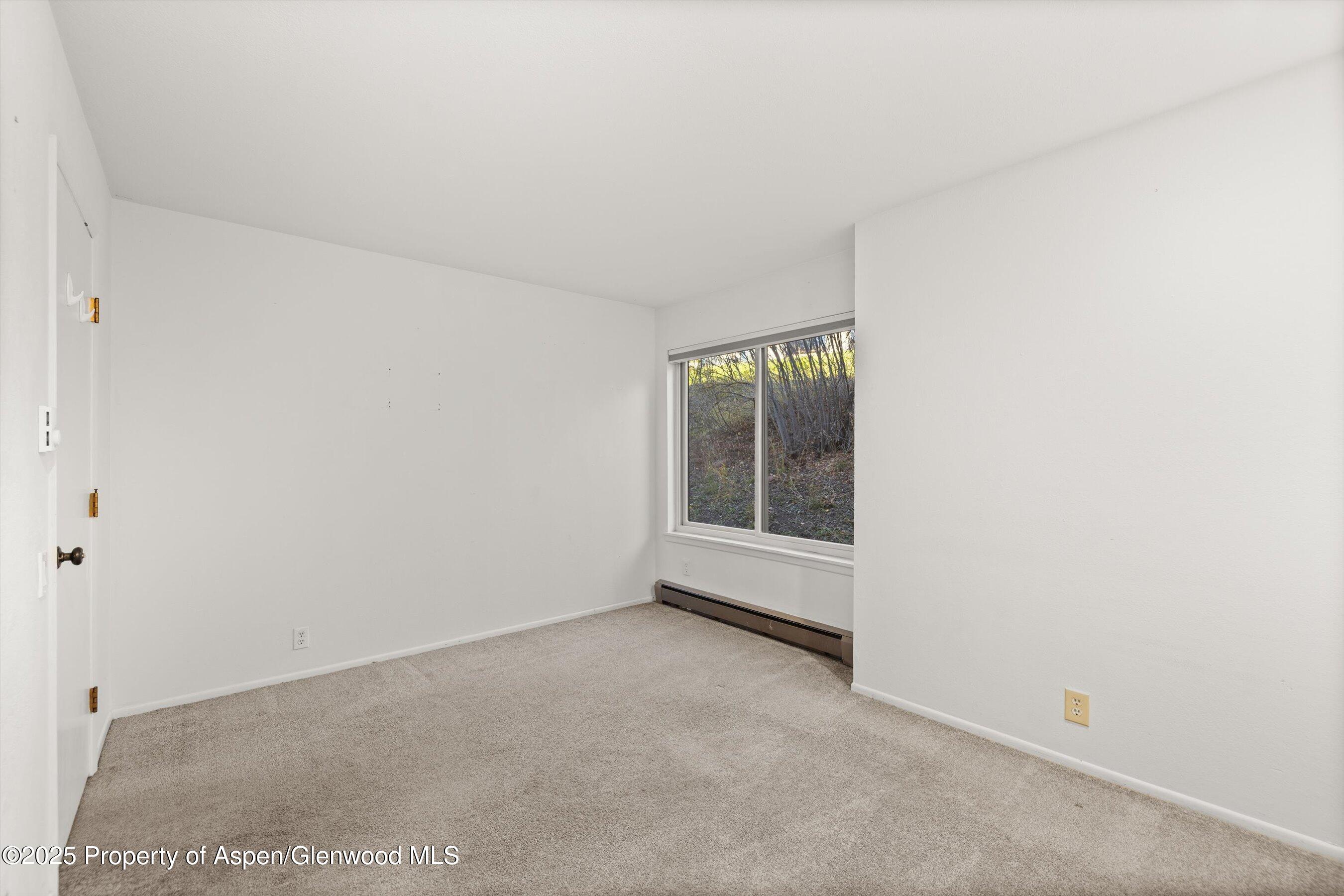 35 Lower Woodbridge Road, Unit V/177 Snowmass Village, CO 81615 - Photo 12 of 15 a view of an empty room with a window