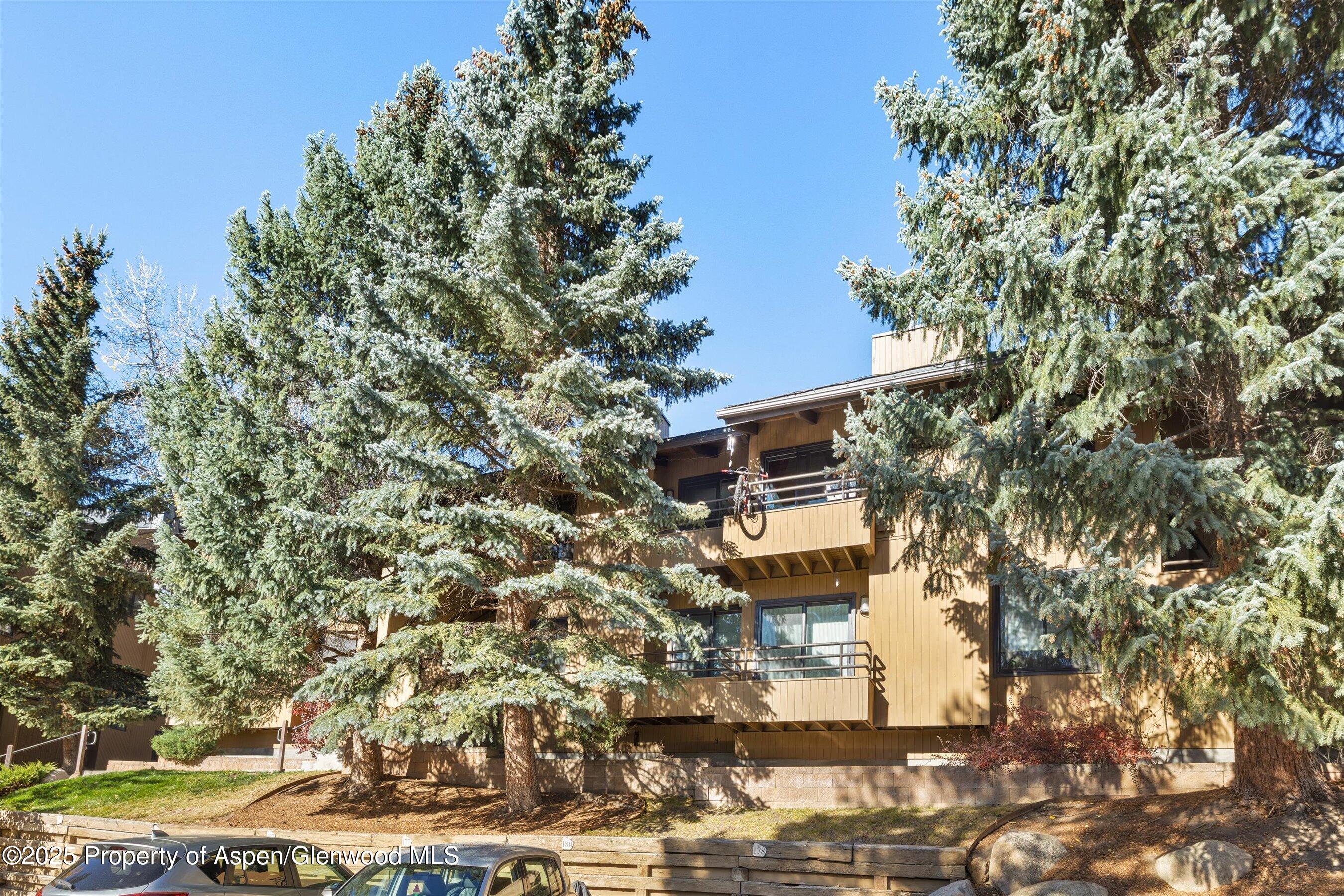 35 Lower Woodbridge Road, Unit V/177 Snowmass Village, CO 81615 - Photo 15 of 15 a aerial view of a house with a yard