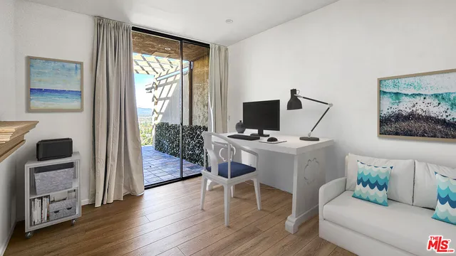 a view of balcony with yard