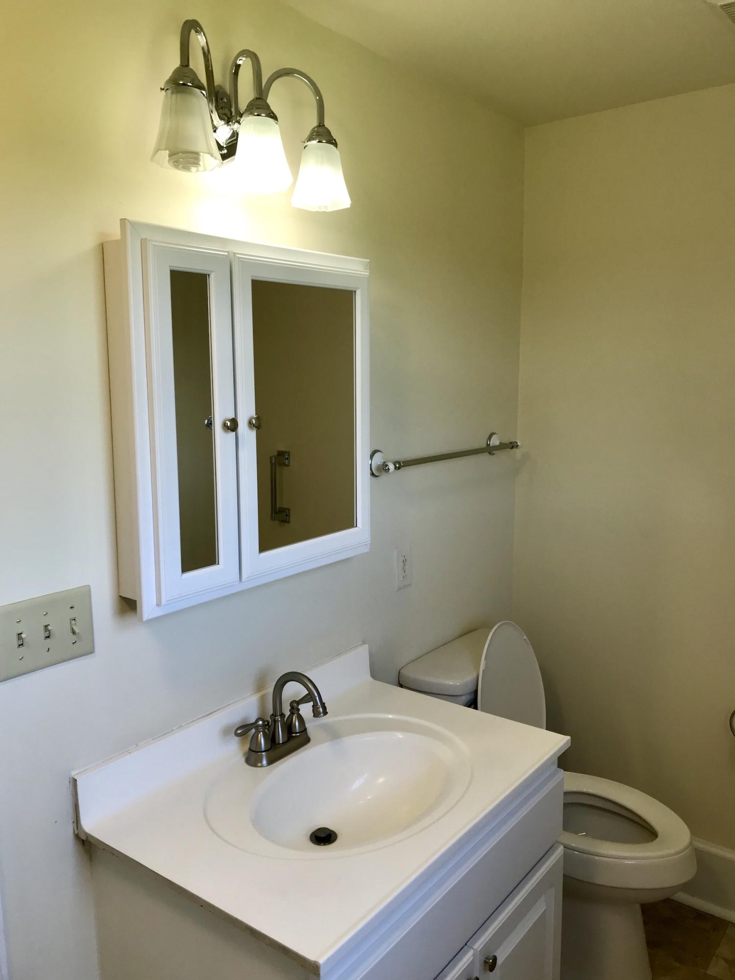 2503 Huffville Road Pilot, VA 24138 - Photo 14 of 26 a bathroom with a sink and a toilet