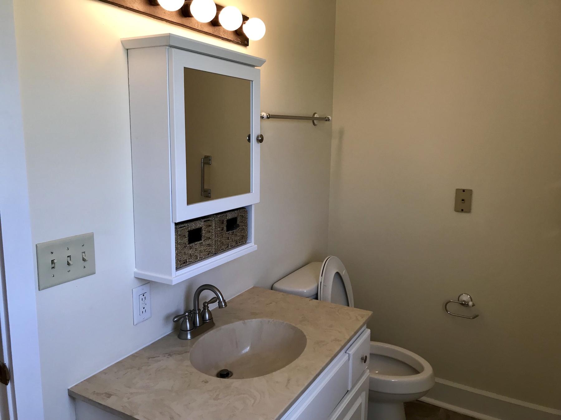 2503 Huffville Road Pilot, VA 24138 - Photo 18 of 26 a bathroom with a sink and a toilet