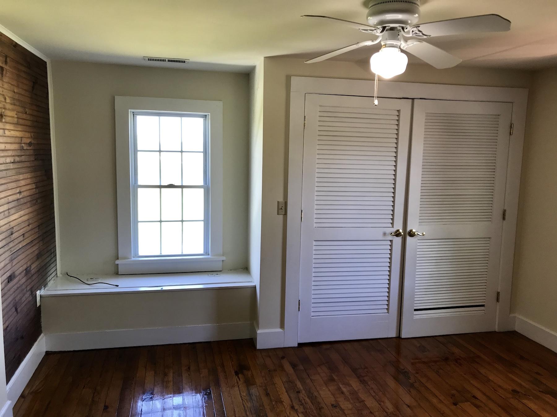 2503 Huffville Road Pilot, VA 24138 - Photo 6 of 26 a room with wooden floors and window