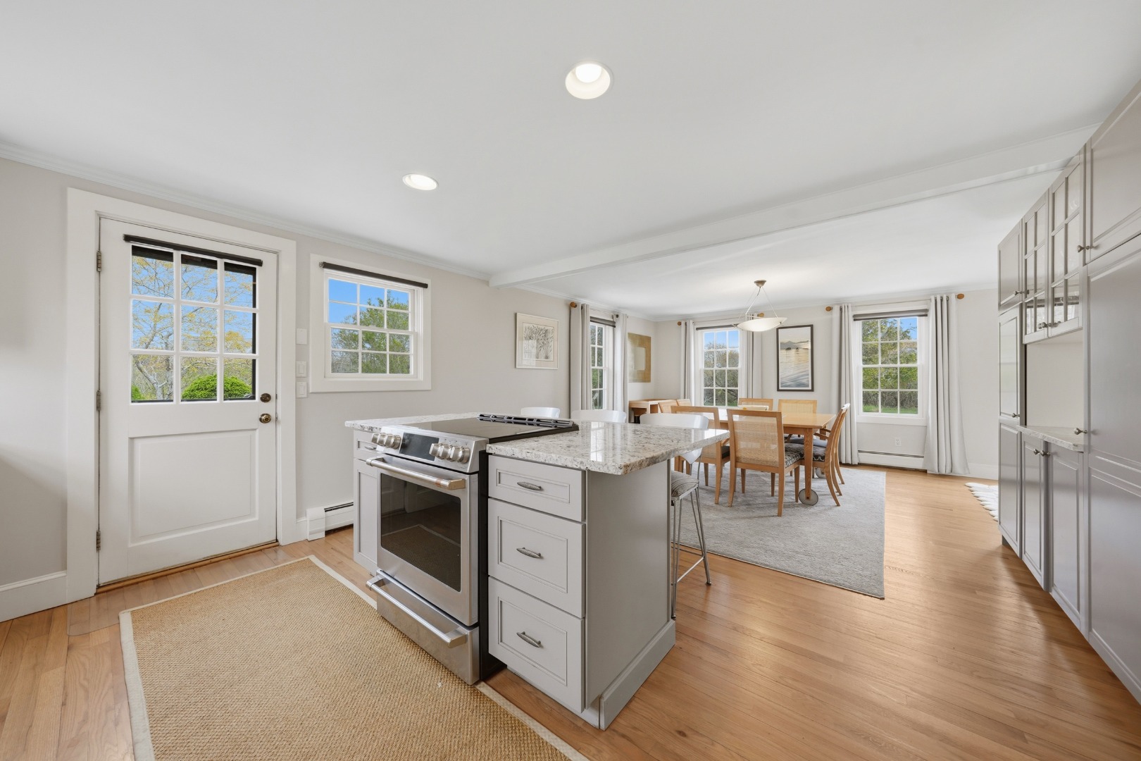 4 Flintlock Road Nantucket, MA 02554 - Photo 16 of 62 kitchen and side entry to outdoor shower and patio 1