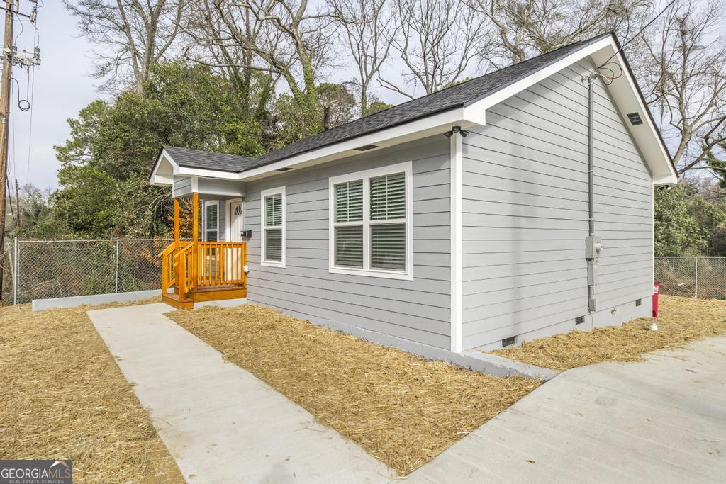1909 Dannenberg Avenue Macon, GA 31201 - Photo 40 of 55 a backyard of a house with seating space