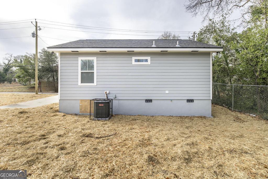 1909 Dannenberg Avenue Macon, GA 31201 - Photo 53 of 55 a view of a house with a yard