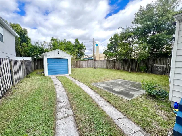 a view of a backyard with a garden