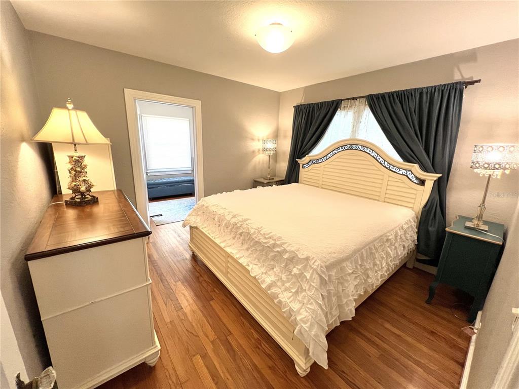 115 Harvard Street Orlando, FL 32804 - Photo 8 of 22 a bedroom with bed and window