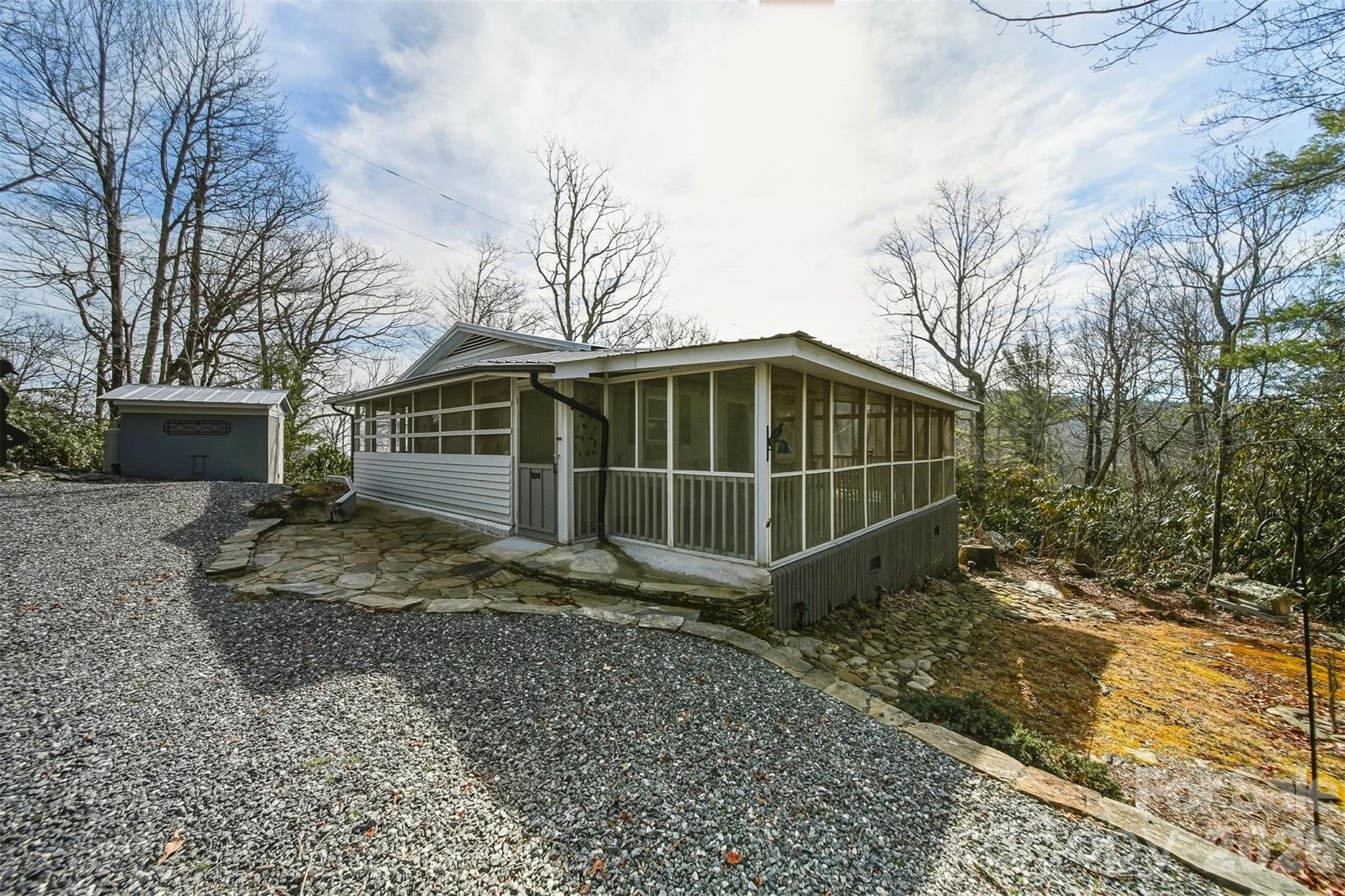 7218 Martin Road Newland, NC 28657 - Photo 4 of 27 a view of a house with a yard