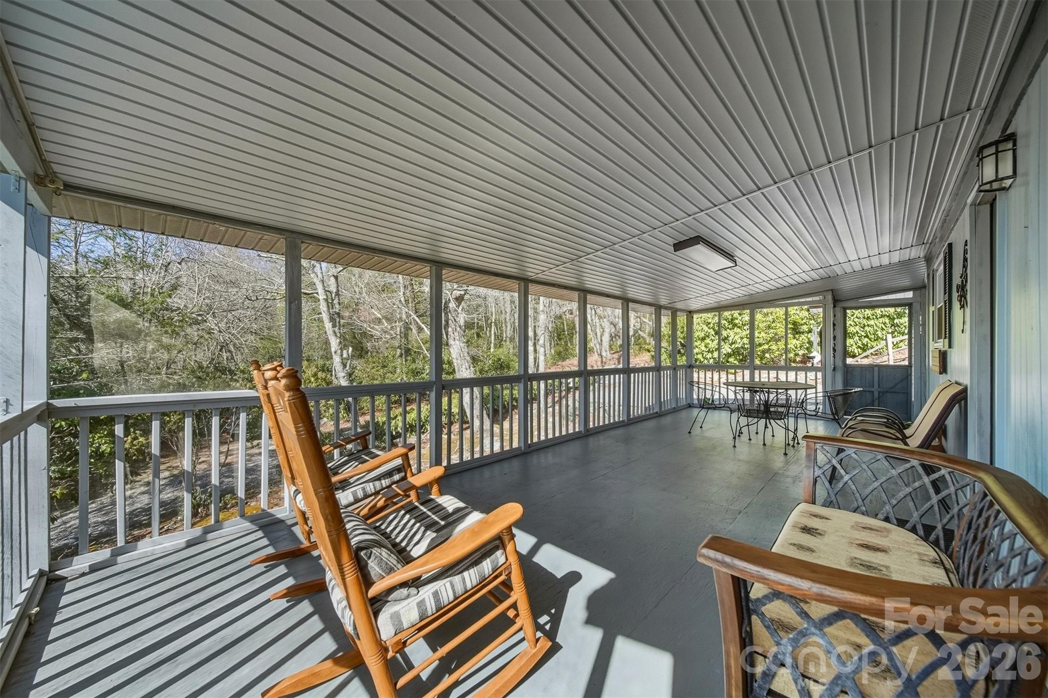7218 Martin Road Newland, NC 28657 - Photo 5 of 27 a living room with furniture next to a large window