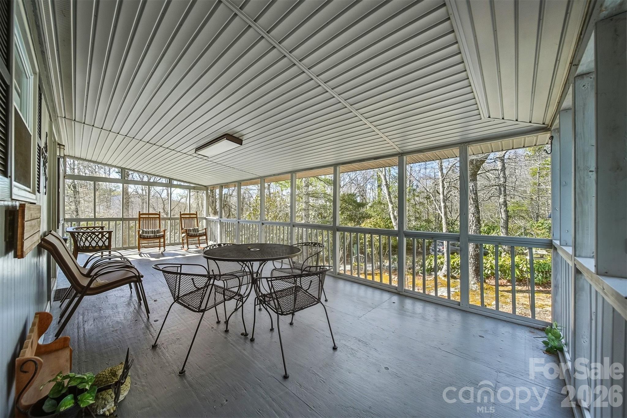 7218 Martin Road Newland, NC 28657 - Photo 6 of 27 a view of a dining room with furniture window and outside view