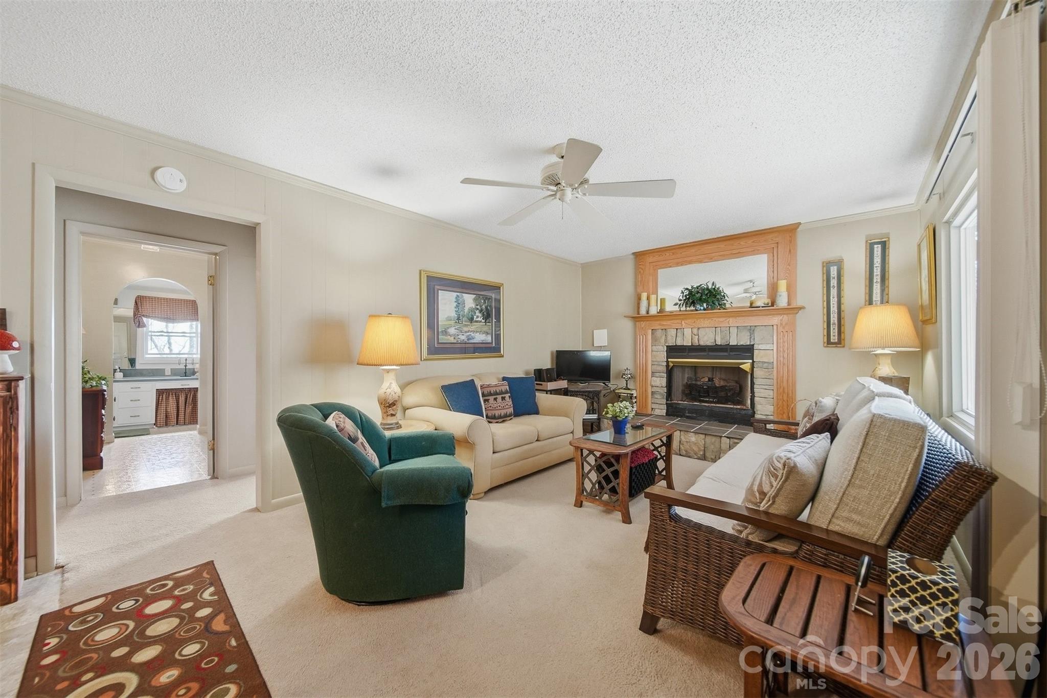 7218 Martin Road Newland, NC 28657 - Photo 7 of 27 a living room with furniture fireplace and a window