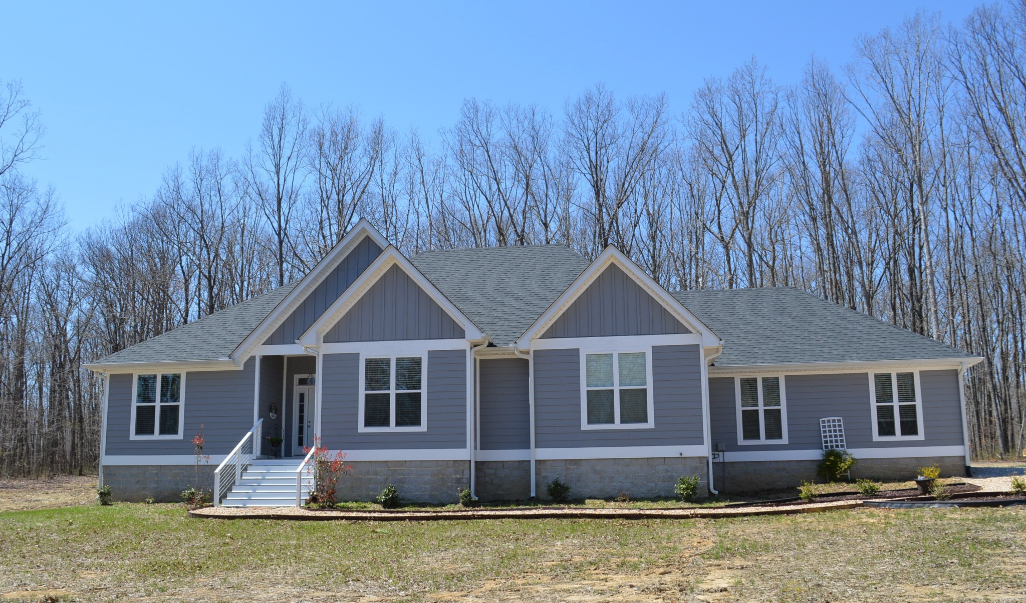1387 Cooley's Rift Boulevard Monteagle, TN 37356 - Photo 1 of 24 a front view of a house with a yard