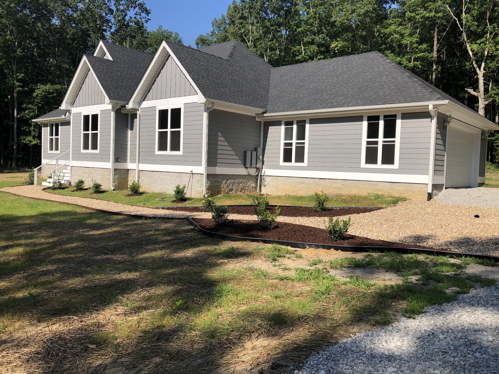 1387 Cooley's Rift Boulevard Monteagle, TN 37356 - Photo 2 of 24 a view of a big house with pool and yard