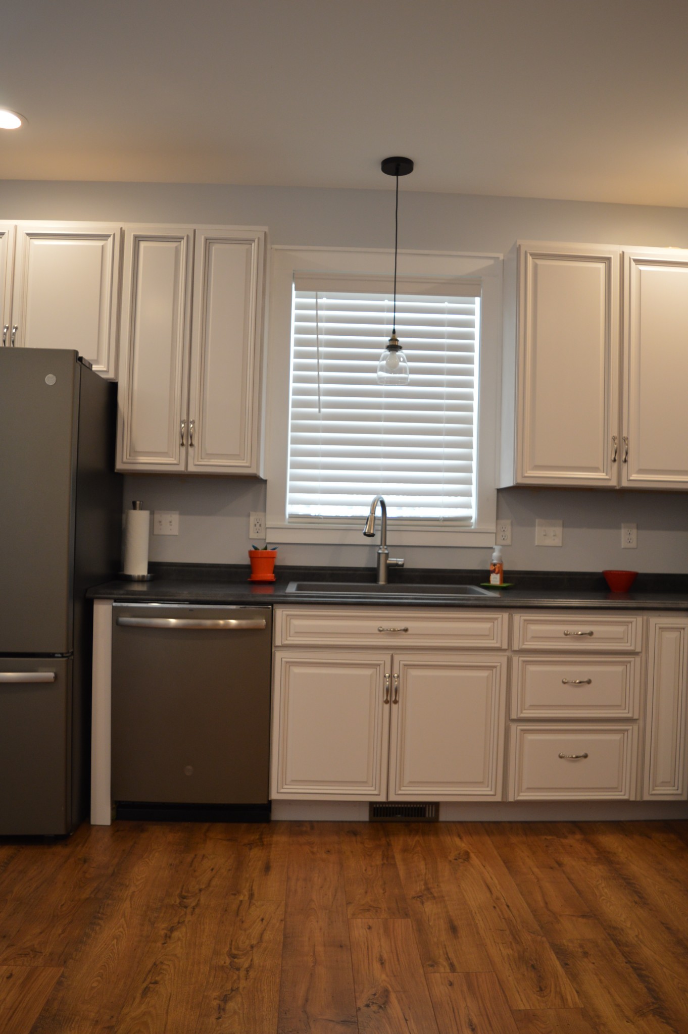 1387 Cooley's Rift Boulevard Monteagle, TN 37356 - Photo 13 of 24 a kitchen with granite countertop white cabinets and white appliances