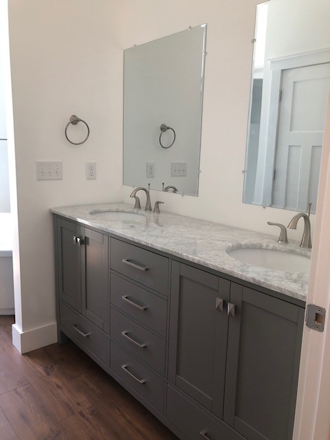 1387 Cooley's Rift Boulevard Monteagle, TN 37356 - Photo 18 of 24 a bathroom with a granite countertop sink and a mirror