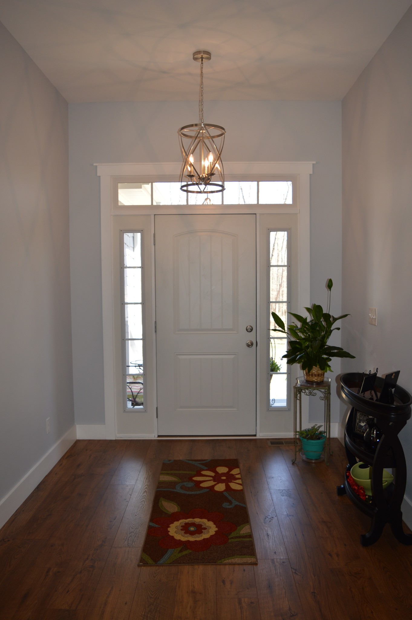1387 Cooley's Rift Boulevard Monteagle, TN 37356 - Photo 9 of 24 a view of a livingroom with wooden floor and a chandelier