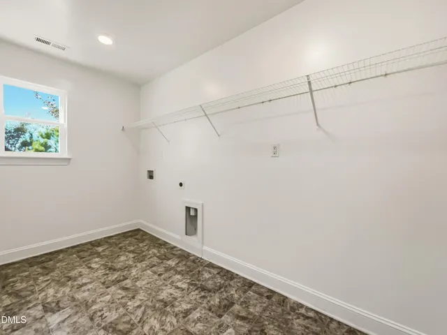 a view of a room with an empty room